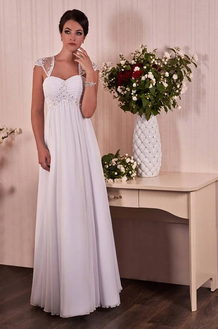 ---Piacenza wedding dress made to measure at an affordable price in empire style made of chiffon with delightful embroidery on t