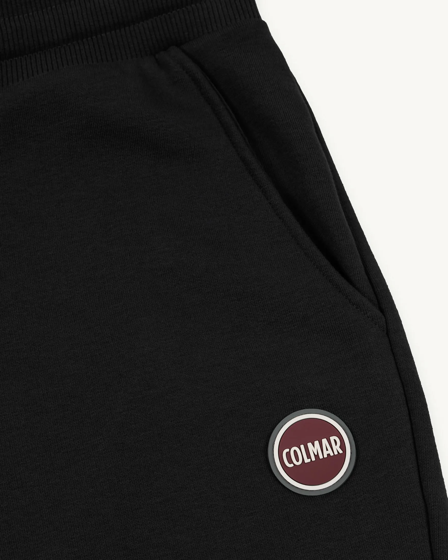 Bermuda nero in felpa di cotone con logo bollo applicato